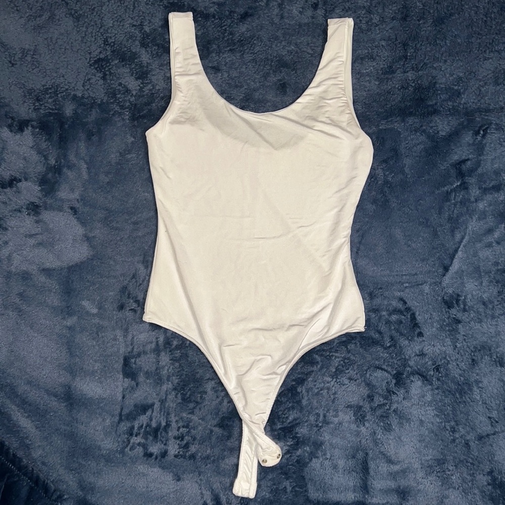 White body suit.
